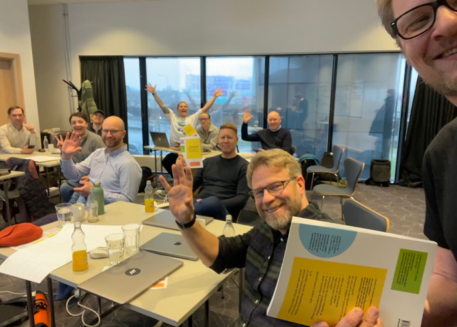 Participants working together in a Core Model masterclass
